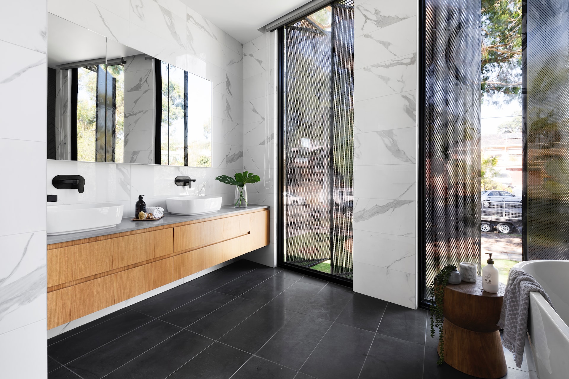 white ceramic sink near white framed glass window